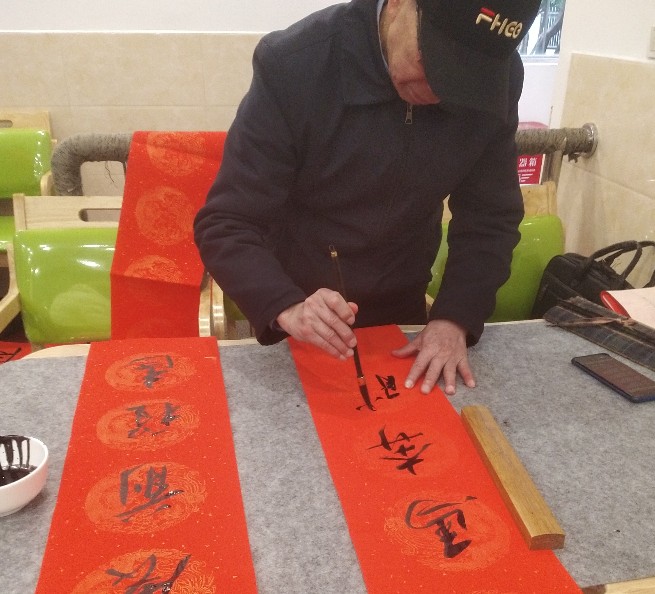 新春送祝福，墨香飘万家